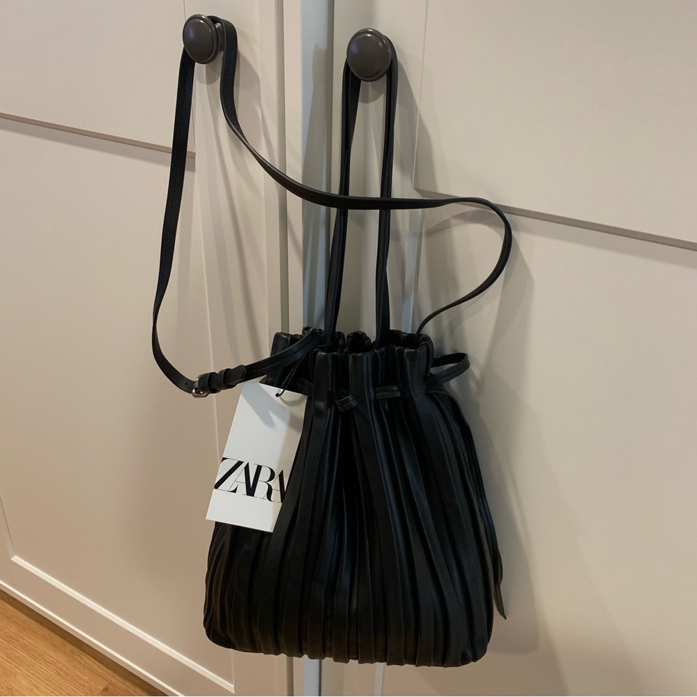Zara drawstring bucket bag in black faux leather